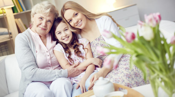 Portrait of happy grandma, mother and daughter