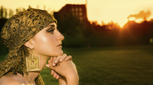 Portrait of sensual woman looking into the sunset