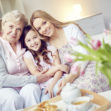 Portrait of happy grandma, mother and daughter