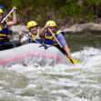 People whitewater rafting